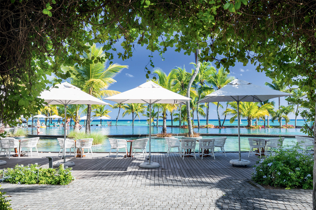 Breakfast by the pool at L'Oasis restaurant